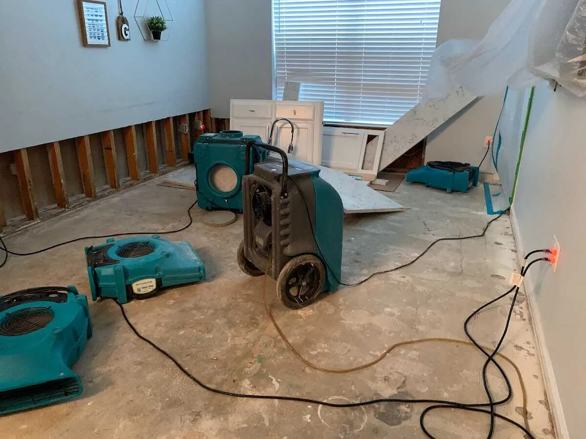 Dehumidifier in flood-cut room for Water Damage Restoration in Camp Springs